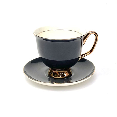 Black tea cup and saucer